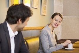 Couple Flirting Together In Bar