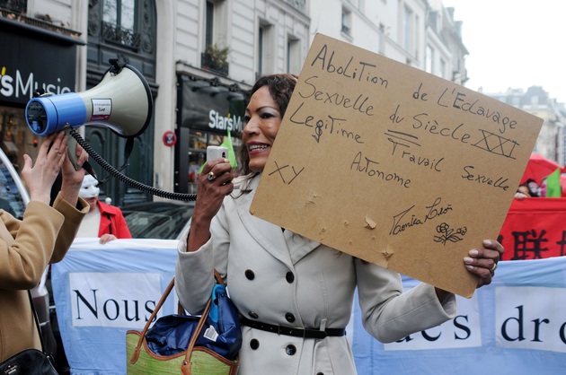 Sex workers protest against a law which aims at criminalizing the customer of a prostitute in Paris, France, on March 28 2015. The law is to arrive in the French Senate on the 30th and 31st of March, after it was passed on the lower Assembly in december 2013. Photo by Alain Apaydin/ABACAPRESS.COM